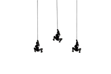 Set of Three Black Resin Climbing Man Hanging Dimensional Sculpture