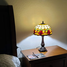 19" Dark Brown Metal Candlestick Table Lamp With Orange Dome Shade