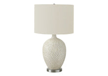 28" White and Silver Ceramic Round Table Lamp With Cream Drum Shade