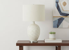 28" White and Silver Ceramic Round Table Lamp With Cream Drum Shade