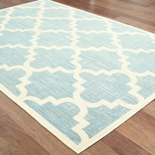 8' Tropical Light Blue And Ivory Quatrafoil Indoor Outdoor Runner Rug